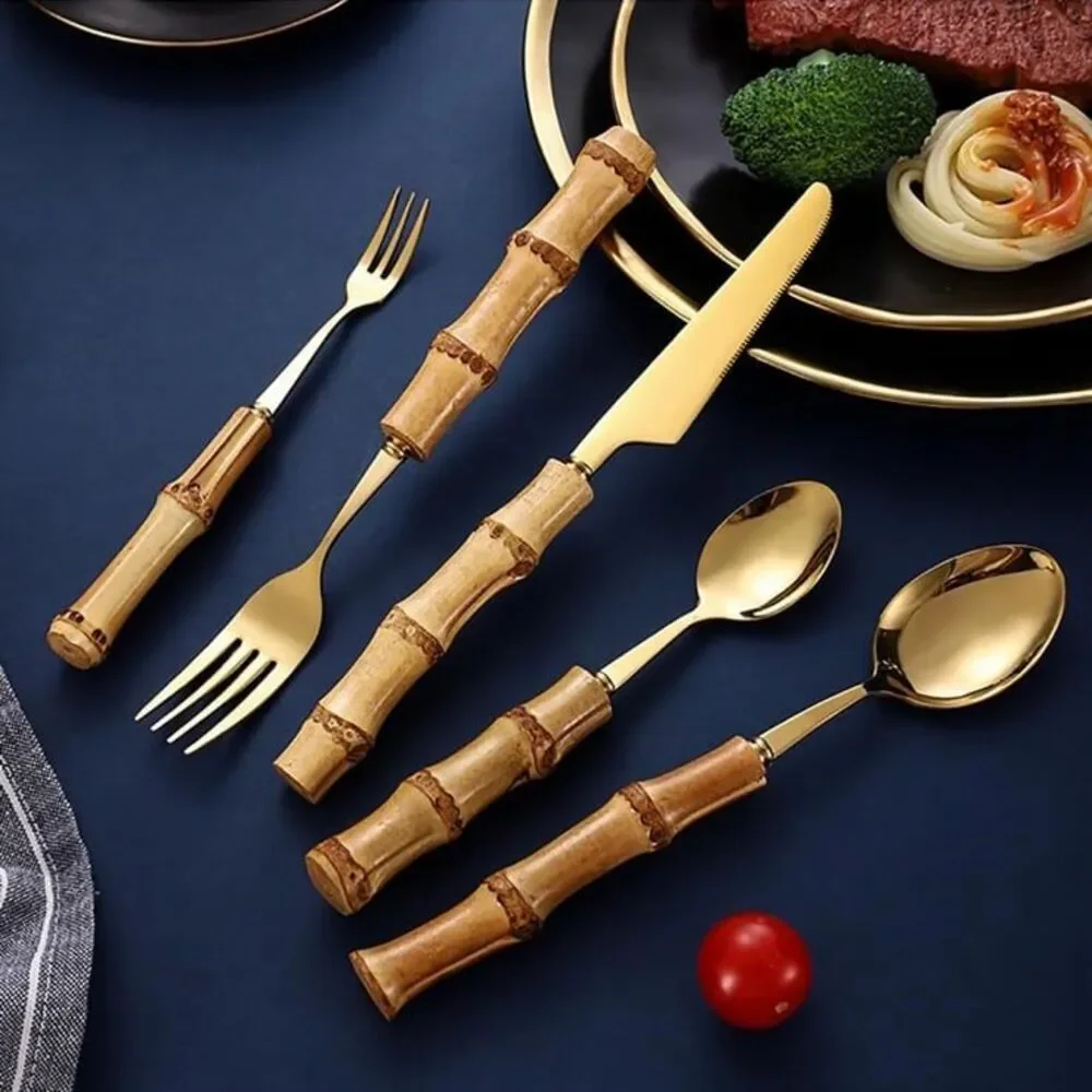 Gold- plated stainless steel natural bamboo cutlery set by US designers Natalia